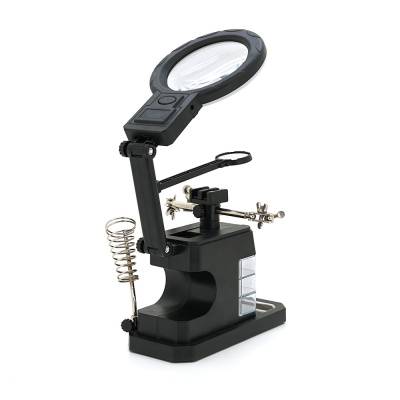 Паяльний тримач "третя рука" TE-803. Лінзи Ø85/32/21мм. Підвищення 2.5X/16X. 16 SMD LEDs. 3 типи затискачів. 218x120x188 мм. Вага: 0.470 кг.